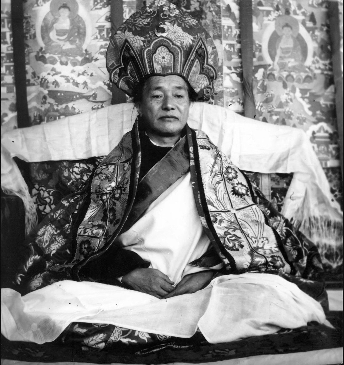 Historic portrait of Kyabje Dudjom Rinpoche seated on a throne